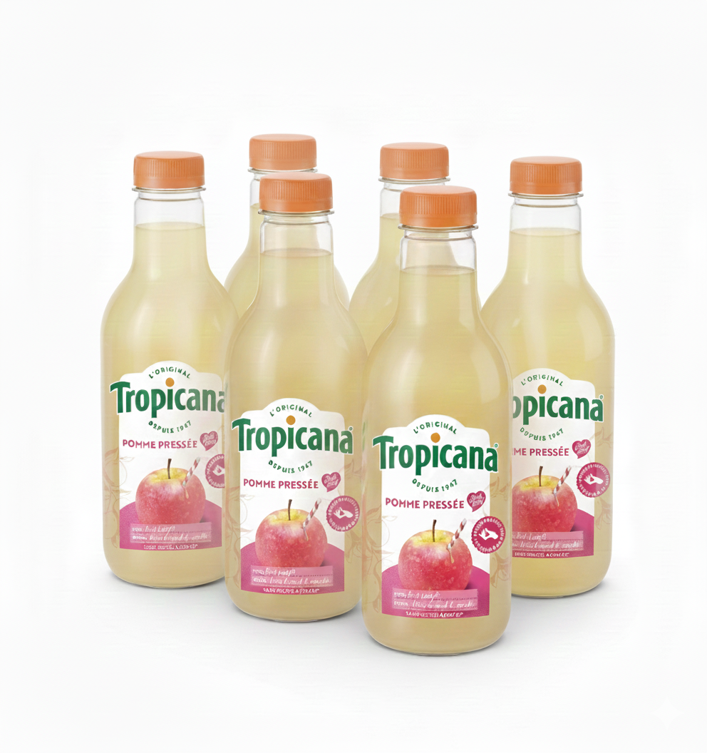 Six bouteilles transparentes de JUS DE POMME DOUCE TROPICANA 1L avec des bouchons orange sont groupées sur un fond blanc. Les étiquettes frontales montrent une image de pomme rouge et le logo Tropicana.